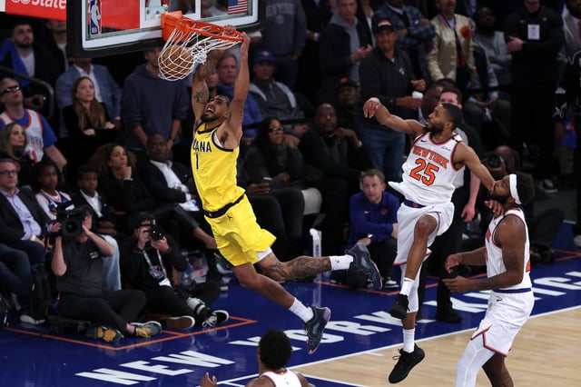 Obi Toppin #1 of the Indiana Pacers dunks the ball against the New York Knicks during overtime in Game One of the Eastern Conference Finals. The Pacers currently lead the series 3-2 over the Knicks.