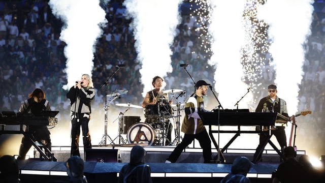 Linkin Park perform inside the stadium before the Champions League Final between Paris St Germain and Inter Milan at the Allianz Arena in Munich, Germany.