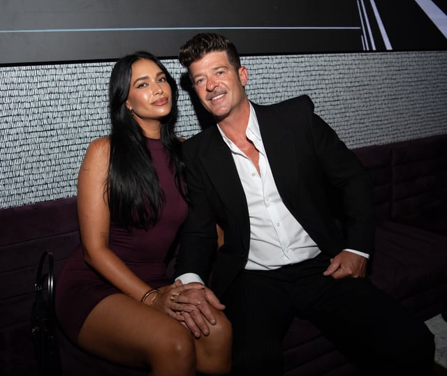 Robin Thicke and April Love Geary attend Fridays With Love Hosted By Robin Thicke at Flo Atlanta on September 20, 2024 in Atlanta, Georgia.