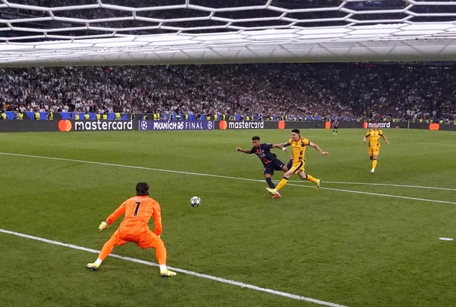 Soccer Football - Champions League - Final - Paris St Germain v Inter Milan - Allianz Arena, Munich, Germany - May 31, 2025 Paris St Germain's Desire Doue scores their third goal Lars Baron/Pool via REUTERS