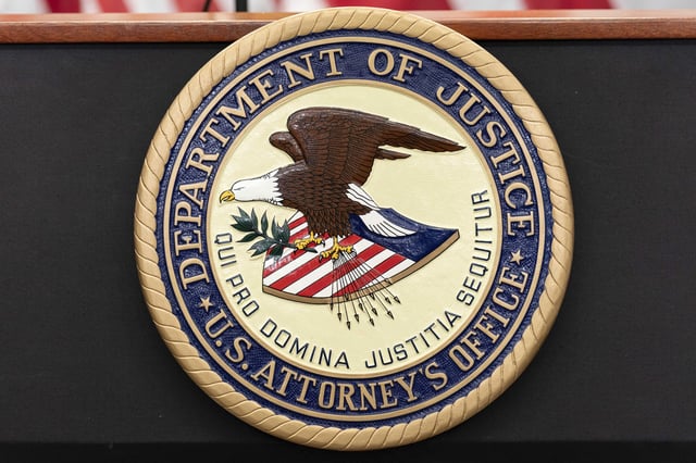 The seal of Department of Justice U.S. Attorney&#39;s Office is seen during a news conference in Washington, Thursday, May 22, 2025.