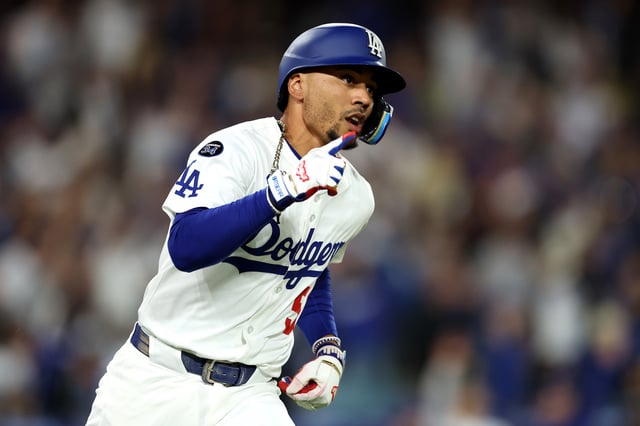 LOS ANGELES, CALIFORNIA - MAY 19: Mookie Betts #50 of the Los Angeles Dodgers reacts after a solo home run against the Arizona Diamondbacks during the sixth inning at Dodger Stadium on May 19, 2025 in Los Angeles, California.
