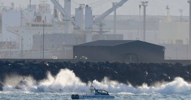 Emergency services are searching for a man tipped overboard after a boat capsized near the Port Kembla break wall. Picture by Adam McLean