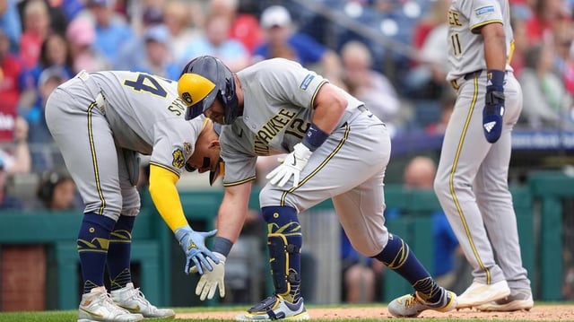 May 31, 2025; Philadelphia, Pennsylvania, USA; Milwaukee Brewers infielder Rhys Hoskins (12) reacts with catcher William Contreras (24) after hitting a three-run home run against the Philadelphia Phillies in the fourth inning at Citizens Bank Park. Mandatory Credit: Kyle Ross-Imagn Images