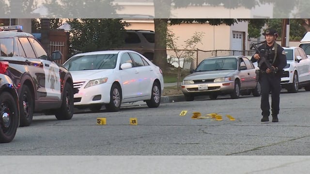 Evidence markers are seen as police respond to a shooting Saturday night in Baldwin Park that injured at least two officers. (Photo by RMG News)