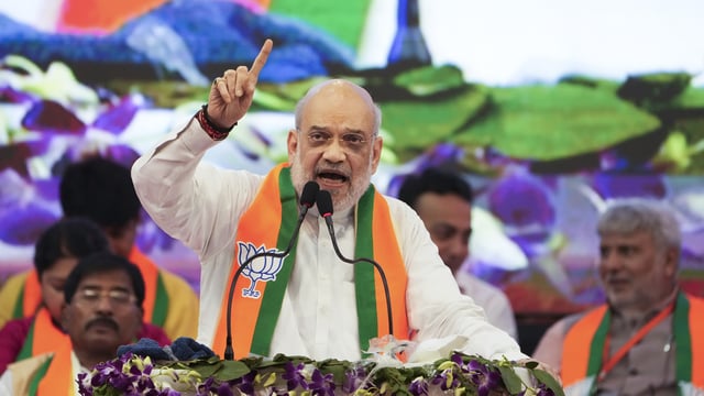 Kolkata: Union Home Minister and senior BJP leader Amit Shah addresses an organisational meeting of the party at Netaji Indoor Stadium in Kolkata, Sunday, June 1, 2025. (PTI Photo/Swapan Mahapatra) (PTI06_01_2025_000139A)