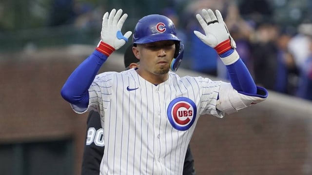 May 28, 2025; Chicago, Illinois, USA; Chicago Cubs outfielder Seiya Suzuki (27) gestures after hitting a one-run double against the Colorado Rockies during the first inning at Wrigley Field. Mandatory Credit: David Banks-Imagn Images