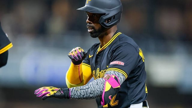 May 31, 2025; San Diego, California, USA; Pittsburgh Pirates designated hitter Andrew McCutchen (22) celebrates with the dugout after hitting a single during the seventh inning against the San Diego Padres at Petco Park. Mandatory Credit: David Frerker-Imagn Images