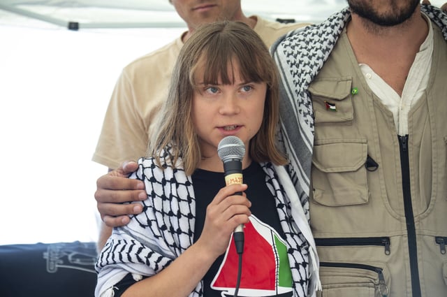 Climate activist Greta Thunberg with other activists from a human rights organization meets with journalists in Catania, Italy, Sunday, June 1, 2025, ahead of their departure for the Mideast. (AP Photo/Salvatore Cavalli)