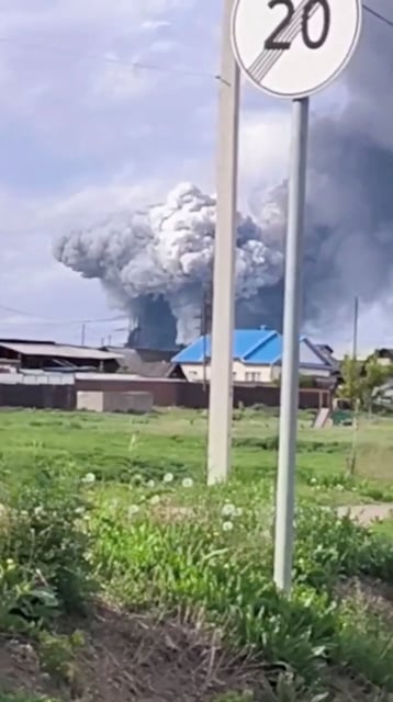 Smoke rises above the area following what local authorities called a drone attack on a military unit in the Sredny settlement, in the course of Russia-Ukraine conflict in the Usolsky district of the Irkutsk region, Russia, in this still image from a video published June 1, 2025.