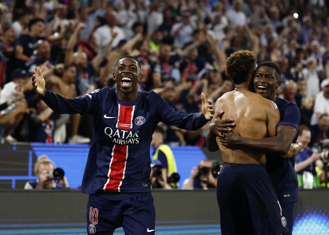 Soccer Football - Champions League - Final - Paris St Germain v Inter Milan - Allianz Arena, Munich, Germany - May 31, 2025 Paris St Germain's Desire Doue celebrates scoring their third goal with Ousmane Dembele and Nuno Mendes REUTERS/Stephanie Lecocq/File Photo