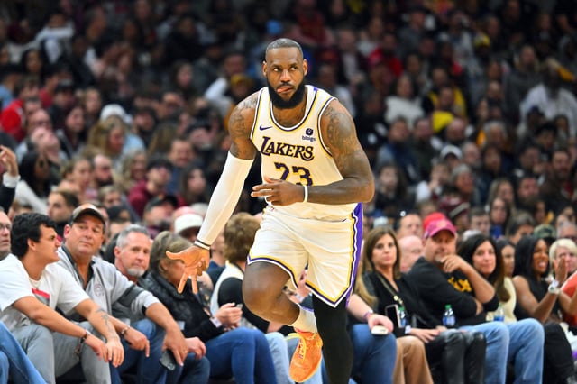 LeBron James #23 of the Los Angeles Lakers celebrates after scoring during the fourth quarter against the Cleveland Cavaliers at Rocket Mortgage Fieldhouse on November 25, 2023 in Cleveland, Ohio.