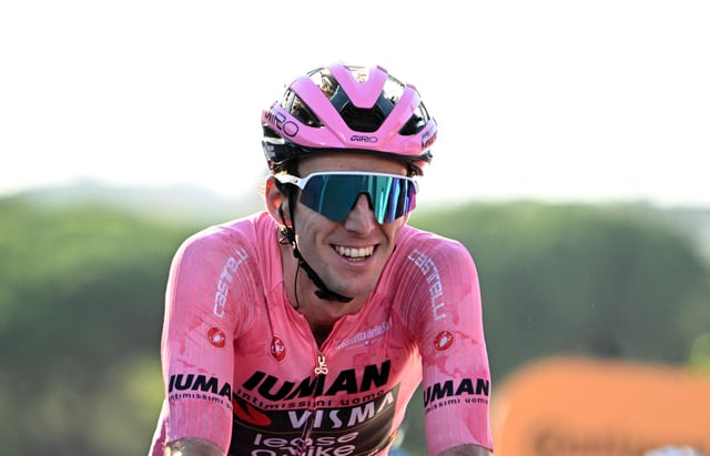 Cycling - Giro d'Italia - Stage 21 - Rome to Rome - Italy - June 1, 2025 Team Visma | Lease a Bike's Simon Yates celebrates after crossing the line to win the Giro d'Italia REUTERS/Jennifer Lorenzini