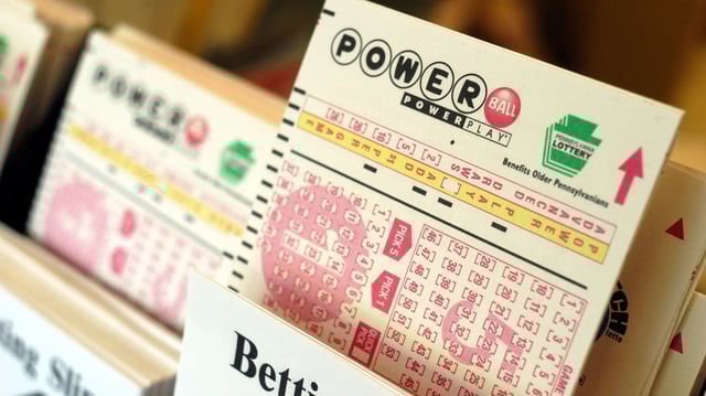 WASHINGTON CROSSING, PA – MAY 10: Powerball tickets await players at Cumberland Farms convenience store May 10, 2004 in Washington Crossing, Pennsylvania. The winner of the May 8th $213 million dollar Powerball jackpot has yet to come forward. For selling the winning ticket, the Cumberland Farms store will receive $400,000. (Photo by William Thomas Cain/Getty Images)