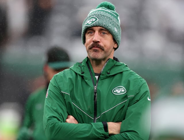 Aaron Rodgers #8 of the New York Jets looks on during warm ups prior to the game against the Atlanta Falcons at MetLife Stadium on December 03, 2023 in East Rutherford, New Jersey.