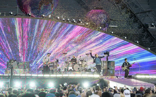 Jonny Buckland, from left, Will Champion, Chris Martin and Guy Berryman of Coldplay at Stanford Stadium on May 31, 2025.