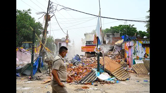 Demolition drive at Madrasi Camp. (Vipin Kumar/HT Photo)