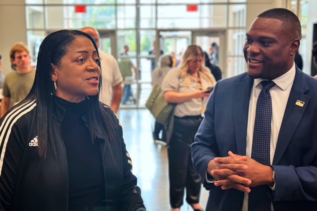 Tulsa Mayor Monroe Nichols speaks with North Tulsa resident Rose Hardwick on Thursday, May 22, 2025, as part of a series of "community conversations" the first-term mayor had across the city. (AP Photo/Sean Murphy