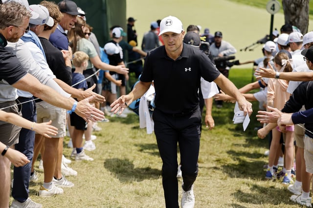 DUBLIN, OHIO - JUNE 01: Jordan Spieth of the United States greets fans while walking to the fifth tee during the final round of the Memorial Tournament presented by Workday 2025 at Muirfield Village Golf Club on June 01, 2025 in Dublin, Ohio.