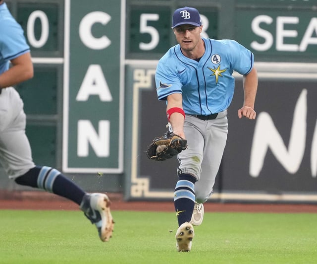 Tampa Bay Rays outfielder Jake Mangum (28) gets Houston Astros first base Christian Walker (8) hit for an RBI single at Daikin Park in Houston on Sunday, June 1, 2025.