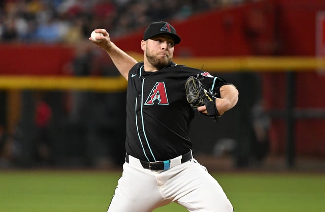 PHOENIX, ARIZONA - APRIL 12: Corbin Burnes #39 of the Arizona Diamondbacks delivers a first inning pitch against the Milwaukee Brewers at Chase Field on April 12, 2025 in Phoenix, Arizona.