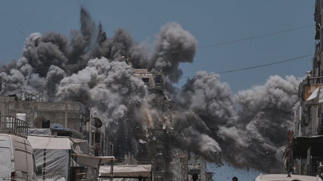 Smoke rises to the sky following an Israeli strike in Gaza City, Sunday, June 1, 2025. 