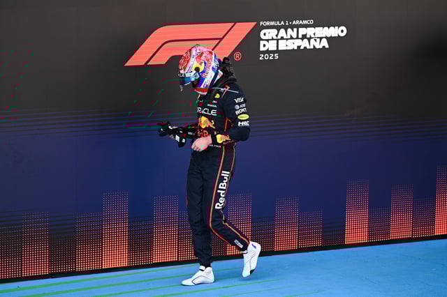 Max Verstappen of the Netherlands walks past the podium after driving the (1) Oracle Red Bull Racing RB21 during the F1 Grand Prix of Spain at Circuit de Barcelona-Catalunya on June 01, 2025 in Barcelona, Spain