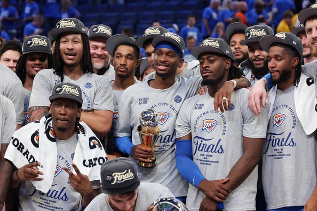 Shai Gilgeous-Alexander #2 of the Oklahoma City Thunder poses with teammates after defeating the Minnesota Timberwolves 124-94 in Game Five of the Western Conference Finals of the 2025 NBA Playoffs at Paycom Center on May 28, 2025 in Oklahoma City, Oklahoma.