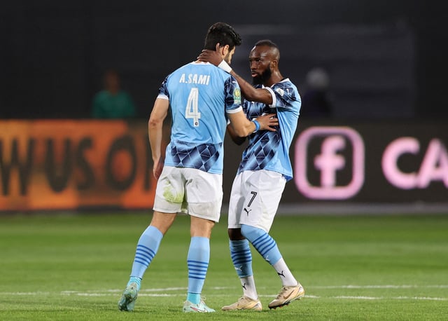 Soccer Football - CAF Champions League - Final - Second Leg - Pyramids v Mamelodi Sundowns - 30 June Stadium, Cairo, Egypt - June 1, 2025 Pyramids' Ibrahim Blati Toure and Ahmed Samy REUTERS/Amr Abdallah Dalsh