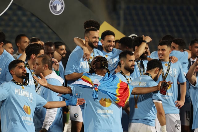 Soccer Football - CAF Champions League - Final - Second Leg - Pyramids v Mamelodi Sundowns - 30 June Stadium, Cairo, Egypt - June 1, 2025 Pyramids players celebrate after winning the CAF Champions League REUTERS/Amr Abdallah Dalsh