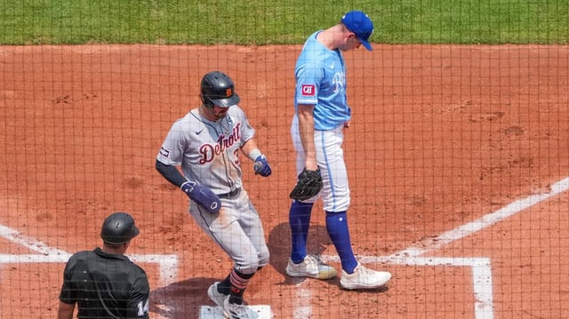 Kansas City Royals starting pitcher Kris Bubic (50) looks away as Detroit Tigers shortstop Zach McKinstry (39) scores in the third inning at Kauffman Stadium on June 1, 2025, in Kansas City.