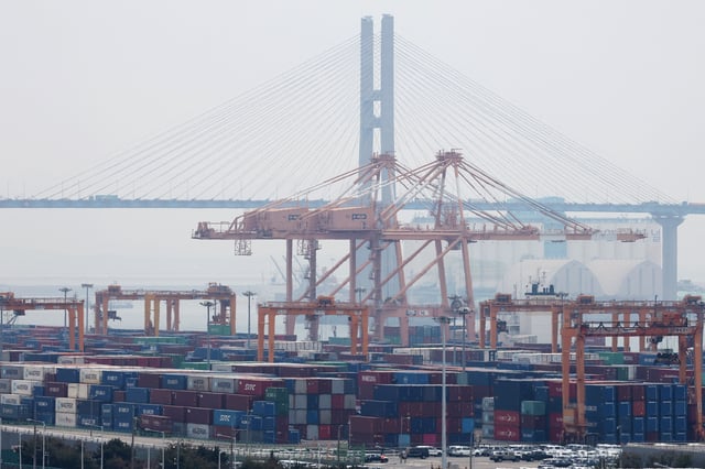 Cranes and shipping containers are seen at Pyeongtaek port in Pyeongtaek, South Korea, April 2, 2025.   REUTERS/Kim Hong-Ji/File photo
