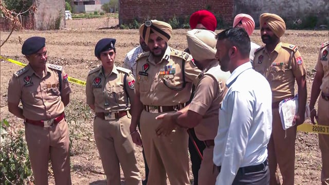 Senior police officials at the site after Amritsar police commissionerate arrests two associated with a terror and extortion module linked to Babbar Khalsa International (BKI) operative Jeevan Fauji, in Amritsar on Sunday. (ANI)