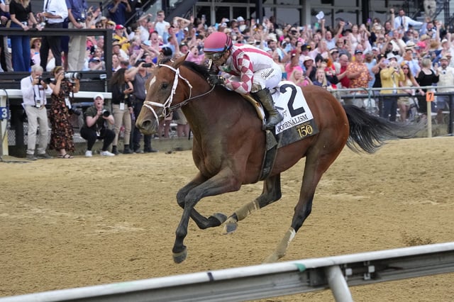 Journalism, with Umberto Rispoli up, wins the Preakness Stakes at Pimlico Race Course in Baltimore, Maryland, on May 17, 2025.