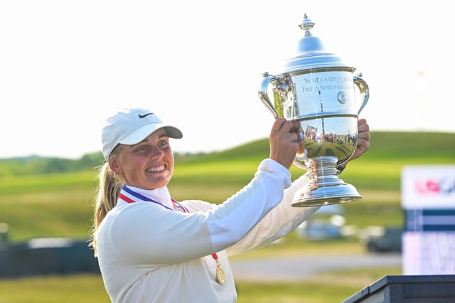 Jun 1, 2025; Erin, Wisconsin, USA; Maja Stark holds up her championship trophy after winning the U.S. Women's Open golf tournament. Mandatory Credit: Benny Sieu-Imagn Images