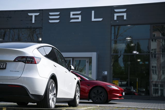 A Tesla electric vehicle is parked at a Tesla dealership, after Tesla, Inc. released its financial results for the first quarter of 2025, in Berlin, Germany April 23, 2025. REUTERS/Annegret Hilse/File Photo
