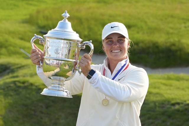 Maja Stark, of Sweden, holds her winning trophy after winning the U.S. Women's Open golf tournament at Erin Hills Sunday, June 1, 2025, in Erin, Wis. (AP Photo/Matt York)