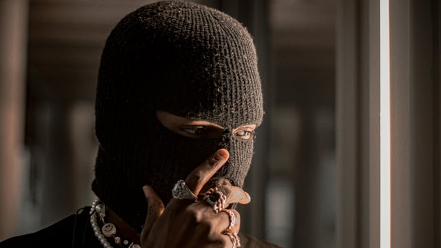  A masked man entered the bank and threatened employees with a knife