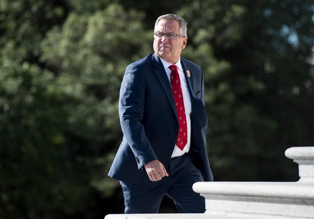 In this October 2019 file photo, Rep. Mike Bost, an Illinois Republican, walks up the steps to the US Capitol.