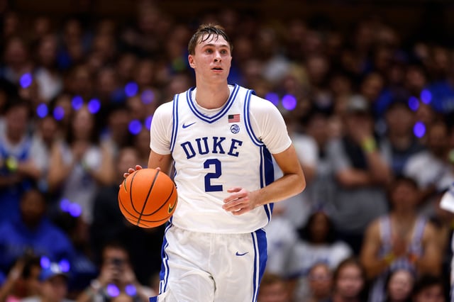 Cooper Flagg #2 of the Duke Blue Devils dribbles up court during Countdown to Craziness at Cameron Indoor Stadium on October 4, 2024 in Durham, North Carolina.