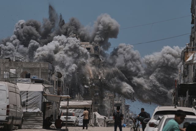Smoke rises to the sky following an Israeli strike in Gaza City, Sunday, June 1, 2025. (AP Photo/)