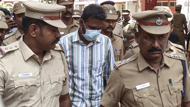 Gnanasekaran, convicted in the Anna University sexual assault case, being escorted by the police after he was sentenced to life imprisonment on Monday.