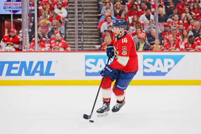May 26, 2025; Sunrise, Florida, USA; Florida Panthers center Aleksander Barkov (16) controls the puck during the first period against the Carolina Hurricanes in game four of the Eastern Conference Final of the 2025 Stanley Cup Playoffs at Amerant Bank Arena. Mandatory Credit: Sam Navarro-Imagn Images/File Photo