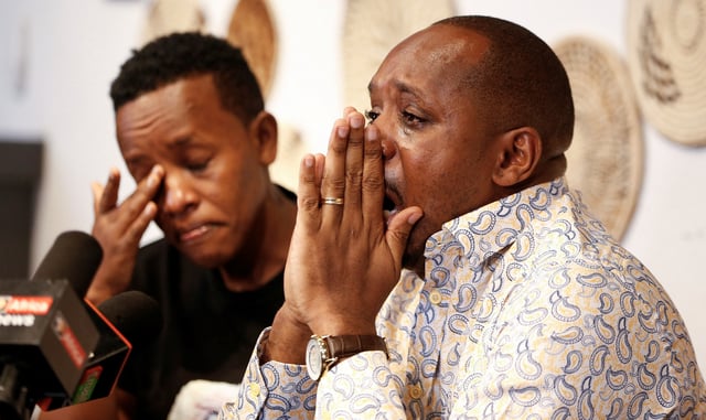 Ugandan activist Agather Atuhaire and Kenyan activist Boniface Mwangi, who were both detained upon their arrival in Dar es Salaam to attend the first court appearance of Tanzanian opposition leader Tundu Lissu, and later released, react as they address a press conference in Nairobi, Kenya June 2, 2025. REUTERS/Thomas Mukoya