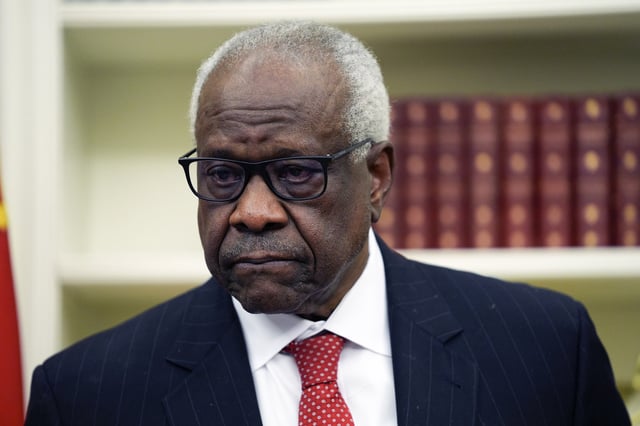 Supreme Court Associate Justice Clarence Thomas listens to President Donald Trump speak before swearing in Pam Bondi as Attorney General in the Oval Office of the White House, Wednesday, Feb. 5, 2025, in Washington.