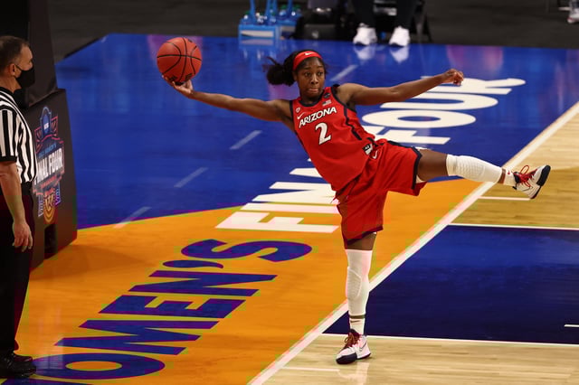 Apr 2, 2021; San Antonio, Texas, USA; Arizona Wildcats guard Aari McDonald (2) reaches for the ball out of bounds against the UConn Huskies during the second half in the national semifinals of the women's Final Four of the 2021 NCAA Tournament at Alamodome. Mandatory Credit: Troy Taormina-USA TODAY Sports