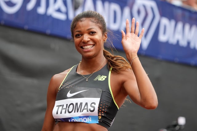 Gabby Thomas poses after winning the women's 200 meters during the London Athletics Meet at London Stadium on July 20, 2024.