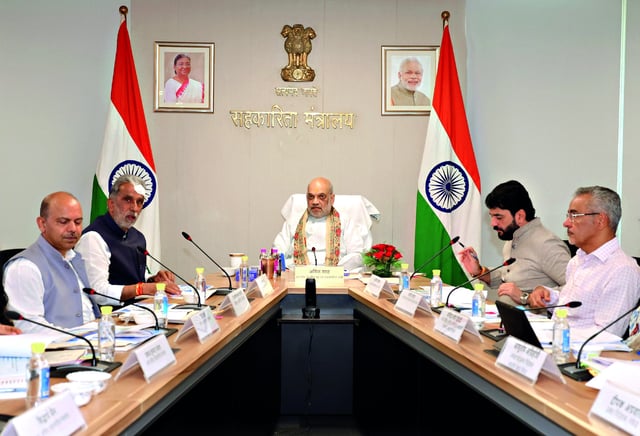 Shah presides over review meeting on world’s largest cooperative food grain storage scheme