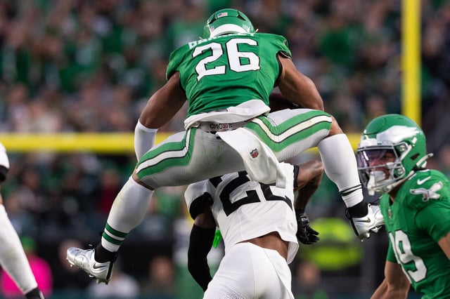 Saquon Barkley's famous backwards hurdle is coming to the cover of Madden NFL 26.