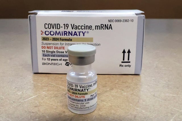 Comirnaty, the new Pfizer/BioNTech vaccination booster for COVID-19, in stock at the Baldwin Park CVS store on New Broad Street in Orlando, Fla., Friday, Sept. 15, 2023. Pharmacies across the U.S. have started administering new COVID-19 boosters, recommended for everyone 6 months and older by the Centers for Disease Control and Prevention. (Joe Burbank/Orlando Sentinel via AP)